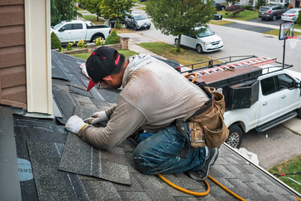 Professional Storm Damage Roof Repair technician working in Talent, OR